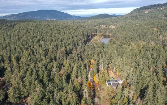 Private Oasis With Solar-Powered Home – SOLD